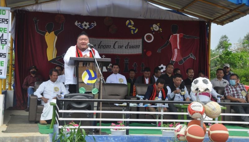 Minister for Higher Education & Tribal Affairs, Temjen Imna Along speaking at the closing ceremony of St Xavier College, Jalukie annual sports and games day on March 31. (DIPR Photo)